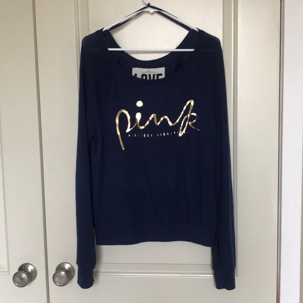 Victoria’s Secret pink sweater.